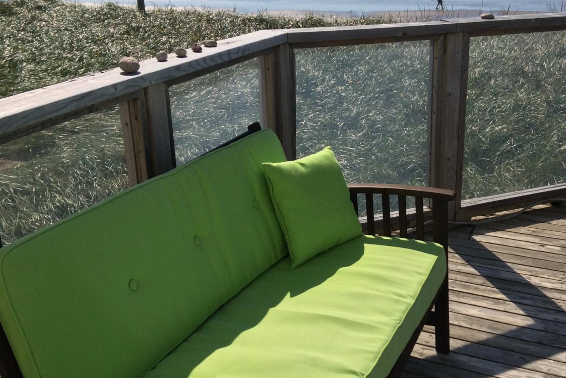Comfortable seating on Moonlight Beach Suites Sea Spray Deck